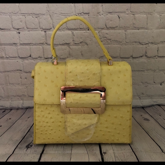 Crossi Handbags - NWT Crossi yellow textured convertible hand bag